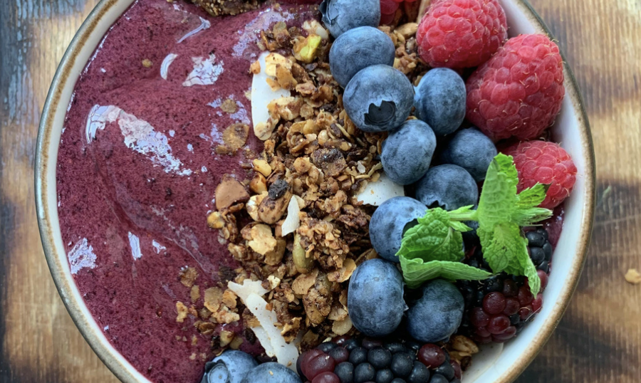 Blood Sugar Balancing smoothie bowl topped with toasted coconut flakes